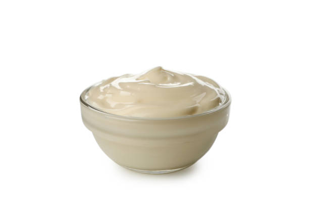istock Bowl with mayonnaise isolated on white background 1296981454