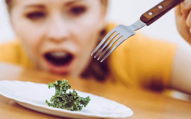 istock Shocked young woman being on diet 1296981491