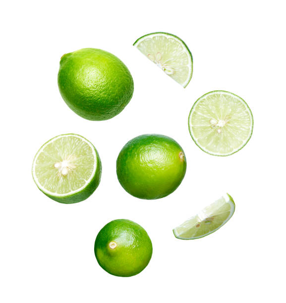 istock Set of whole, half and cut slice fresh lime isolated on white background 1296981686
