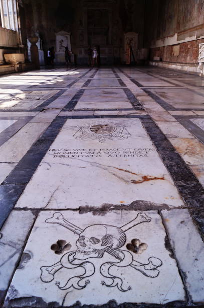 istock Gravestone in the monumental cemetery in Miracles square in Pisa 1296982858