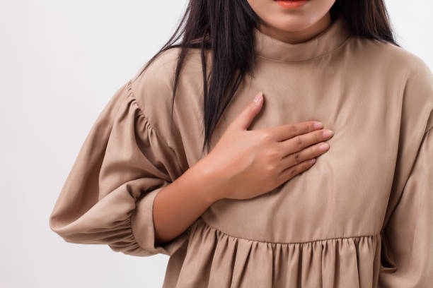istock sick stressed woman with acid reflux, gerd symptoms 1296984714