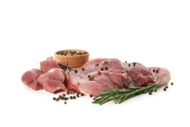 istock Raw steak meat with herbs and spices isolated on white background 1296985876