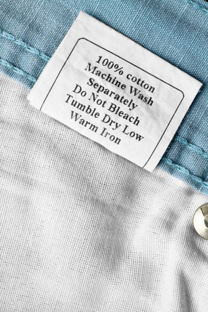 istock Care and composition clothing label 1296986222