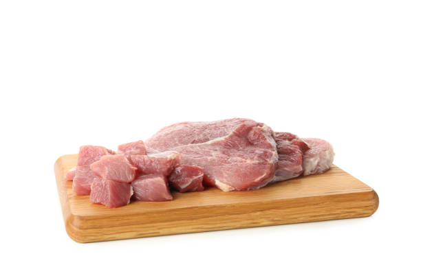 istock Board with raw steak meat isolated on white background 1296986353