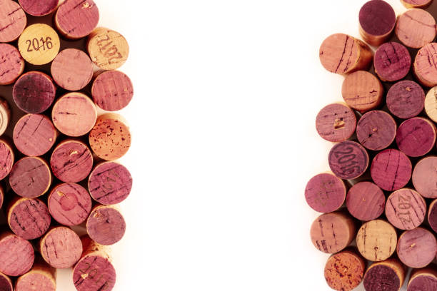 istock Wine corks frame, a design template for a restaurant menu or tasting invitation, overhead shot with copy space 1296989136