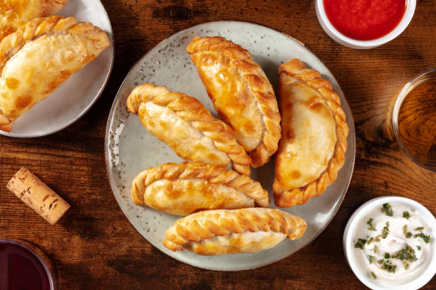 istock Empanadas, top shot with various sauces 1296989423