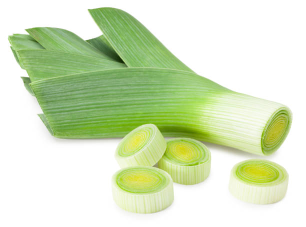 istock leek with slices isolated on white background. with clipping path 1296989680