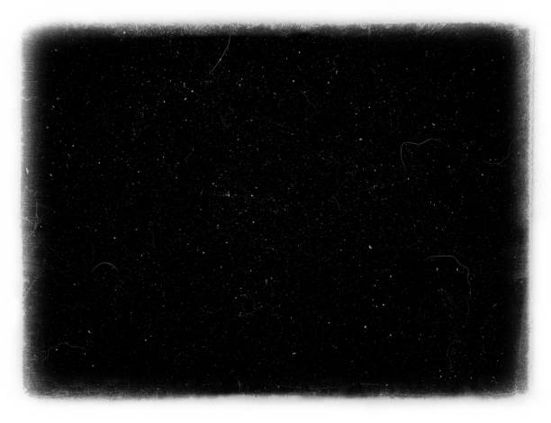 dirt film frame overlay Abstract dirty or aging film frame. Dust particle and grain texture or dirt use for overlay film frame effect with space for vintage grunge design. photographic film camera stock pictures, royalty-free photos & images