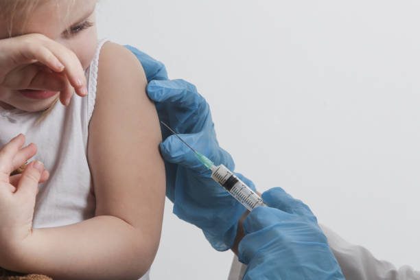 istock Children vaccination. Healthcare and medical concept. Immunization program from infectious diseases. 1296991396