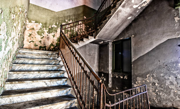 istock Staircase in an abandoned building 1296995158