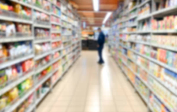istock Abstract blur in supermarket. Grocery shopping concept. 1296995486