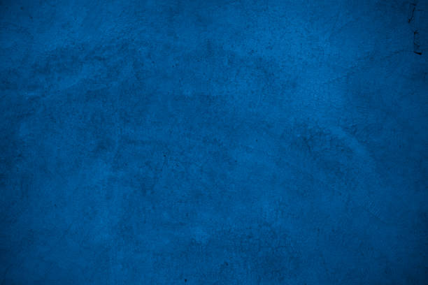 istock Old wall pattern texture cement blue dark abstract  blue color design are light with black gradient background. 1296998434