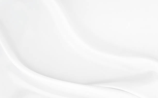 istock White gray satin texture that is white silver fabric silk background with beautiful soft blur pattern natural. 1296998569
