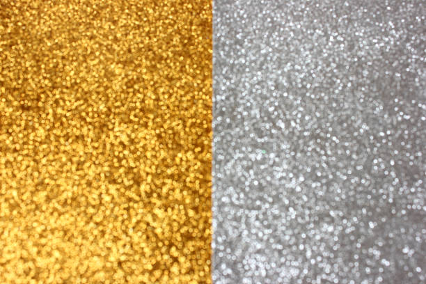 abstrakte hintergrund halb gold und halb silber - spectrum lighting equipment glamour defocused stock-fotos und bilder