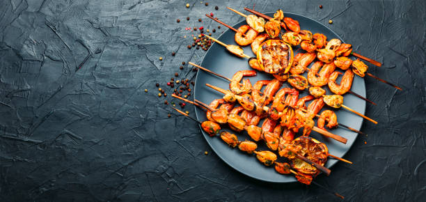 istock Grilled shrimp and mussels skewers 1296998908
