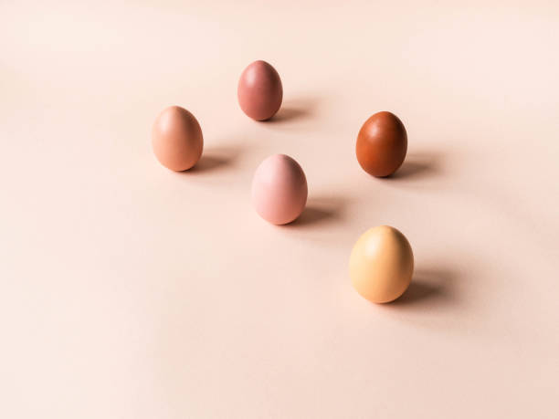istock Set of Easter eggs varios colored on beige background 1296998936