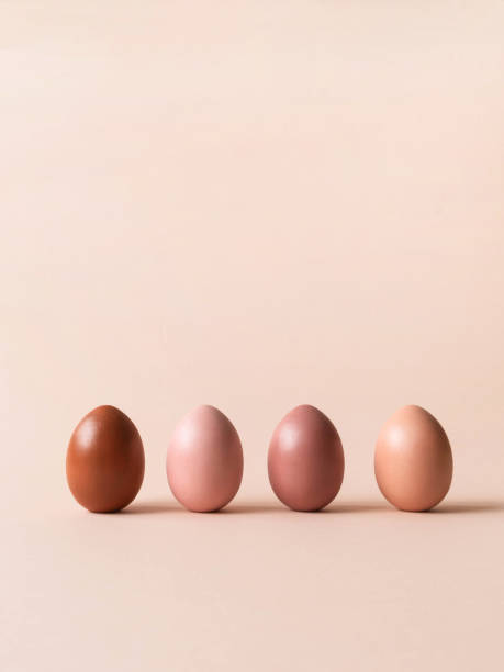 istock Set of Easter eggs varios colored on beige background 1296998961