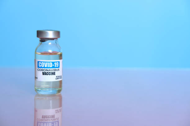 istock Ampoule with COVID-19 coronavirus vaccine, 1296999632