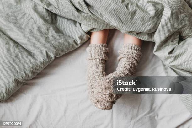 Atmospheric Picture About The Comfort Stock Photo - Download Image Now - Sock, Bed - Furniture, Cozy