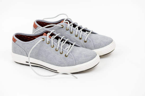 istock A pair of Gray sneakers on a white background 1297000917