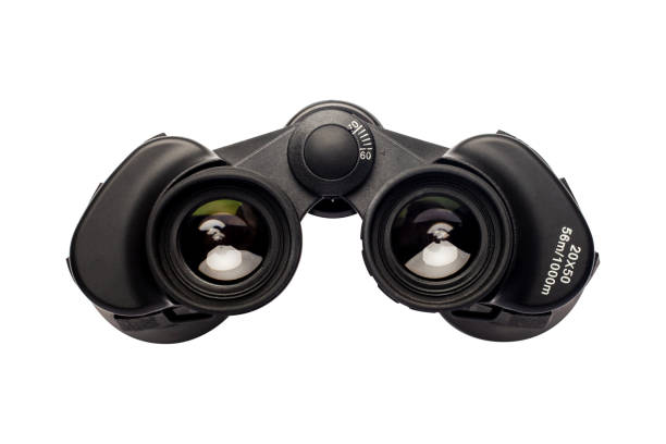 istock Binoculars on an isolated white background. Banner. Flat lay, top view 1297002321