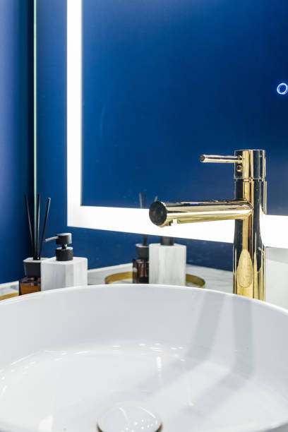 istock Bathroom faucet and sink 1297002582