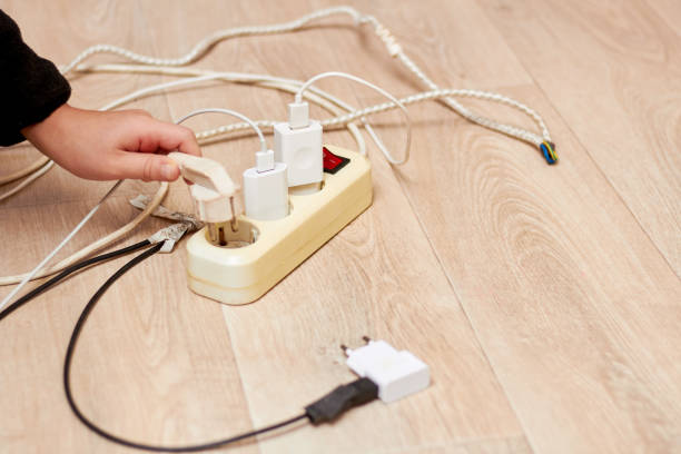 istock It is necessary to teach children to use electrical appliances, distribute the load, a short circuit is possible 1297002819