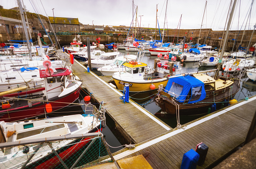 Sail boats at harbour in the village of Whitehills on the Aberdeenshire coast of Northern Scotland.