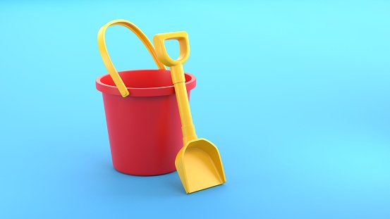 Red and yellow bucket and spade on blue background beach summer vacation holiday 3D render