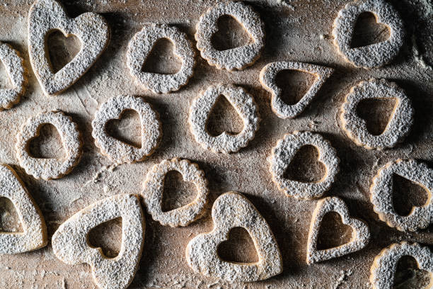 istock Bakery homemade linzer cookies biscuits with powdered sugar 1297008047