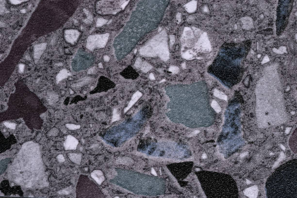 istock Mosaic floor backgound of small pebble pattern with black, blue and white stains 1297008201