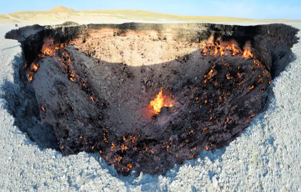 Photo of Darvaza gas crater, also known as the Gates of Hell, - Karakum Desert north of Darvaza, Dashoguz Province, Turkmenistan