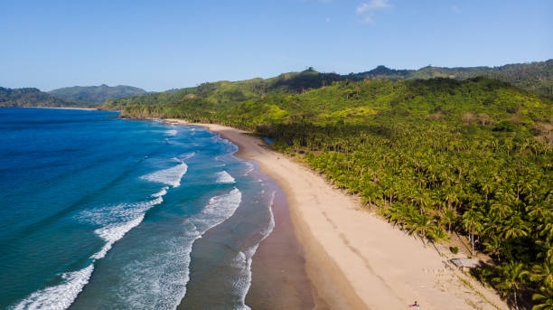 istock Surfing in Duli beach, El Nido, Palawan 1297010285