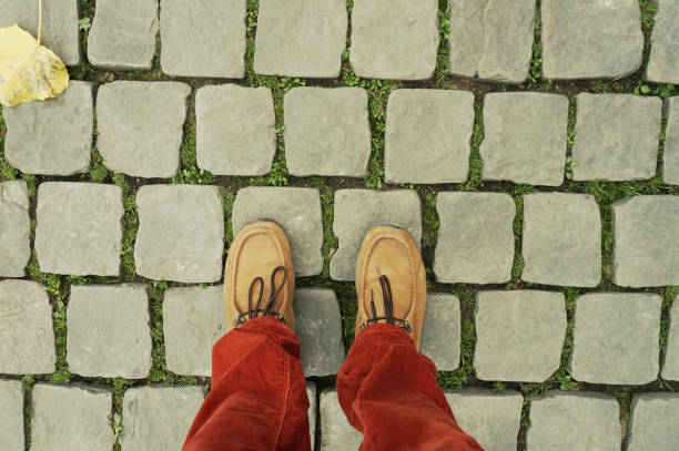 istock Male legs in the street 1297011693