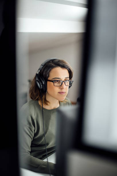istock Woman working on the computer at work or home. 1297015220
