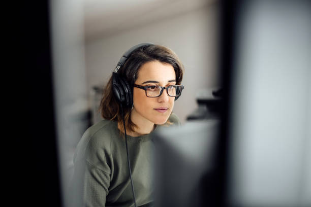 istock Woman working on the computer at work or home. 1297015227