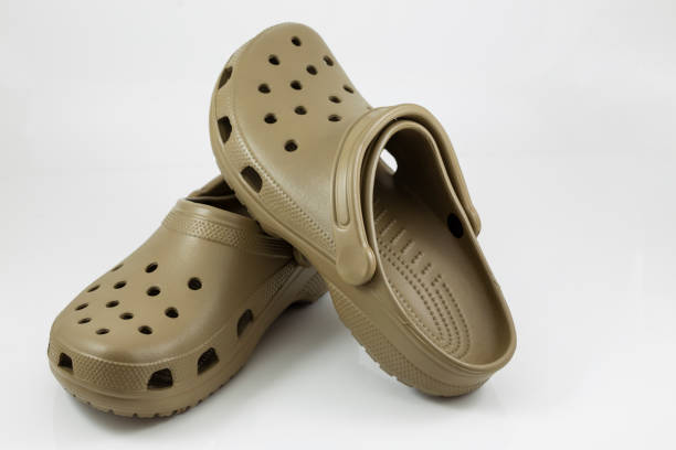 istock Brown rubber sandals on a white background. 1297016675