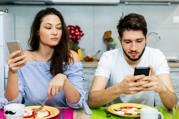 istock Young couple in the kitchen 1297019626