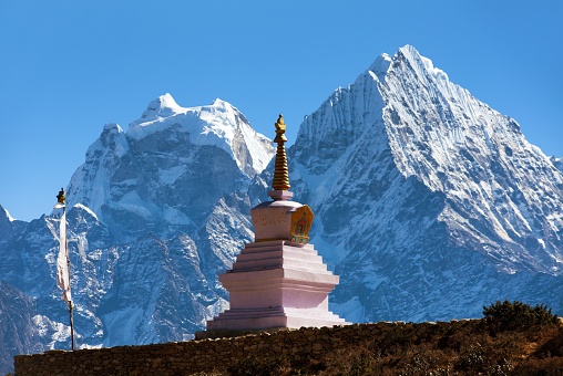Stupa in Thame village and mount Thamserku and Kangtega near Namche Bazar, Everest area, Sagarmatha national park, Nepal