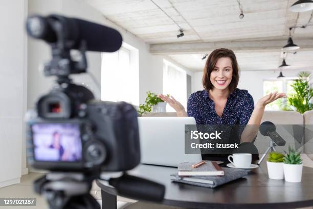 Businesswoman Making A Video Blog In The Office Stock Photo - Download Image Now - 30-39 Years, Adult, Adults Only
