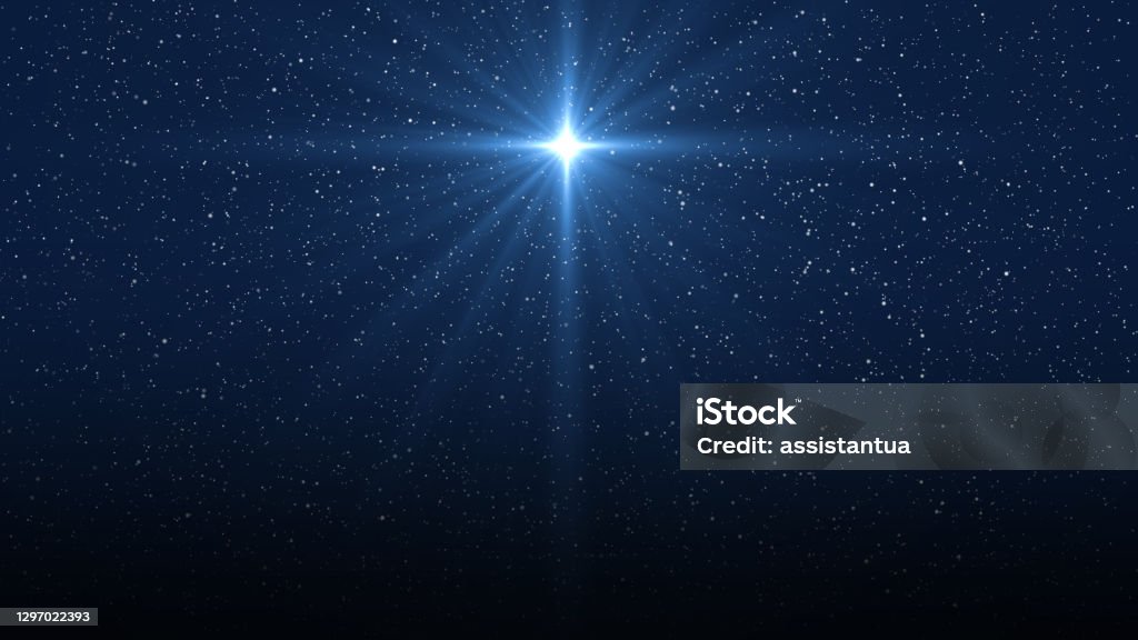 Christmas star of the Nativity of Bethlehem, Nativity of Jesus Christ. Background of the beautiful dark blue starry sky and bright star. Star - Space Stock Photo