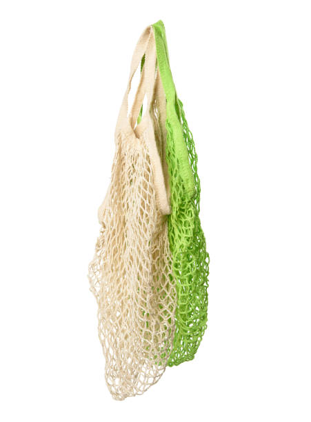 istock white and green reusable string bag woven from thread isolated on white background 1297022801