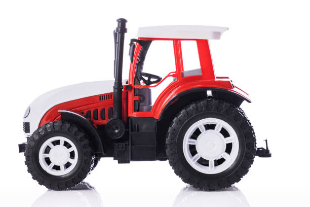 istock Tractor, kids toy isolated on white background 1297022805