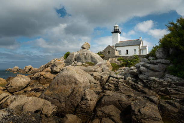 istock Lighthouse De Pontusval on a sunny day in summer 1297023609
