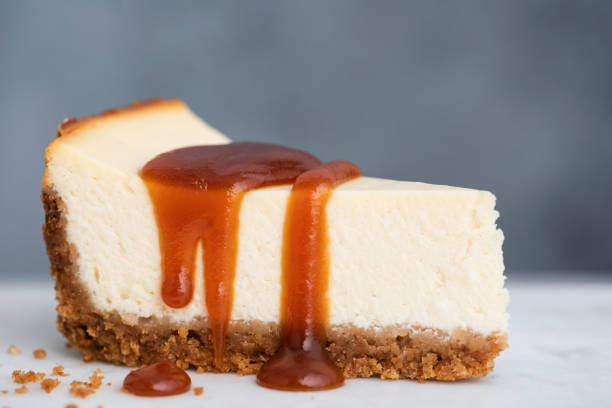 istock Cheesecake slice with salted caramel sauce 1297025501
