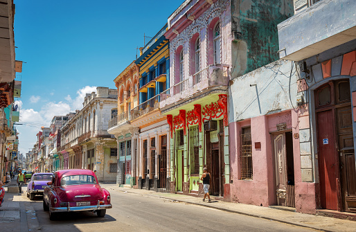 Colorful street with classic old cars in Havana; Cuba