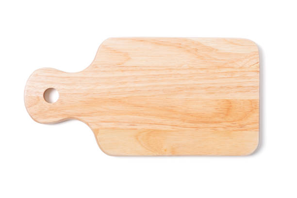 istock Brown wood cutting board with handle and drill hole for hanging isolated 1297032750