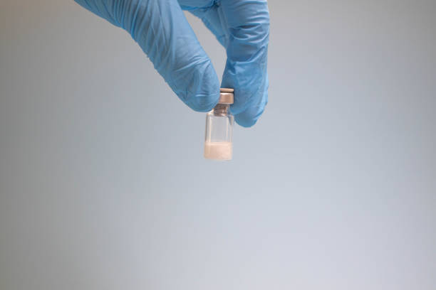 Ampoules with medicine on a white background.