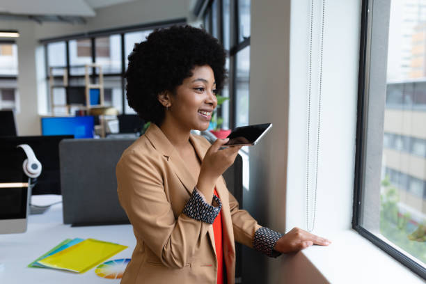 istock Mixed race businesswoman working in creative office 1297033727