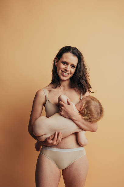 istock Mother breastfeeding her baby 1297035051
